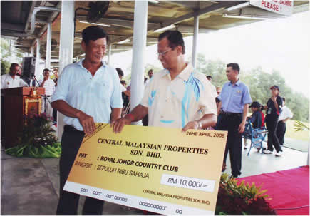 Central Malaysian Properties sdn bhd Donating a cheque for RM 10,000